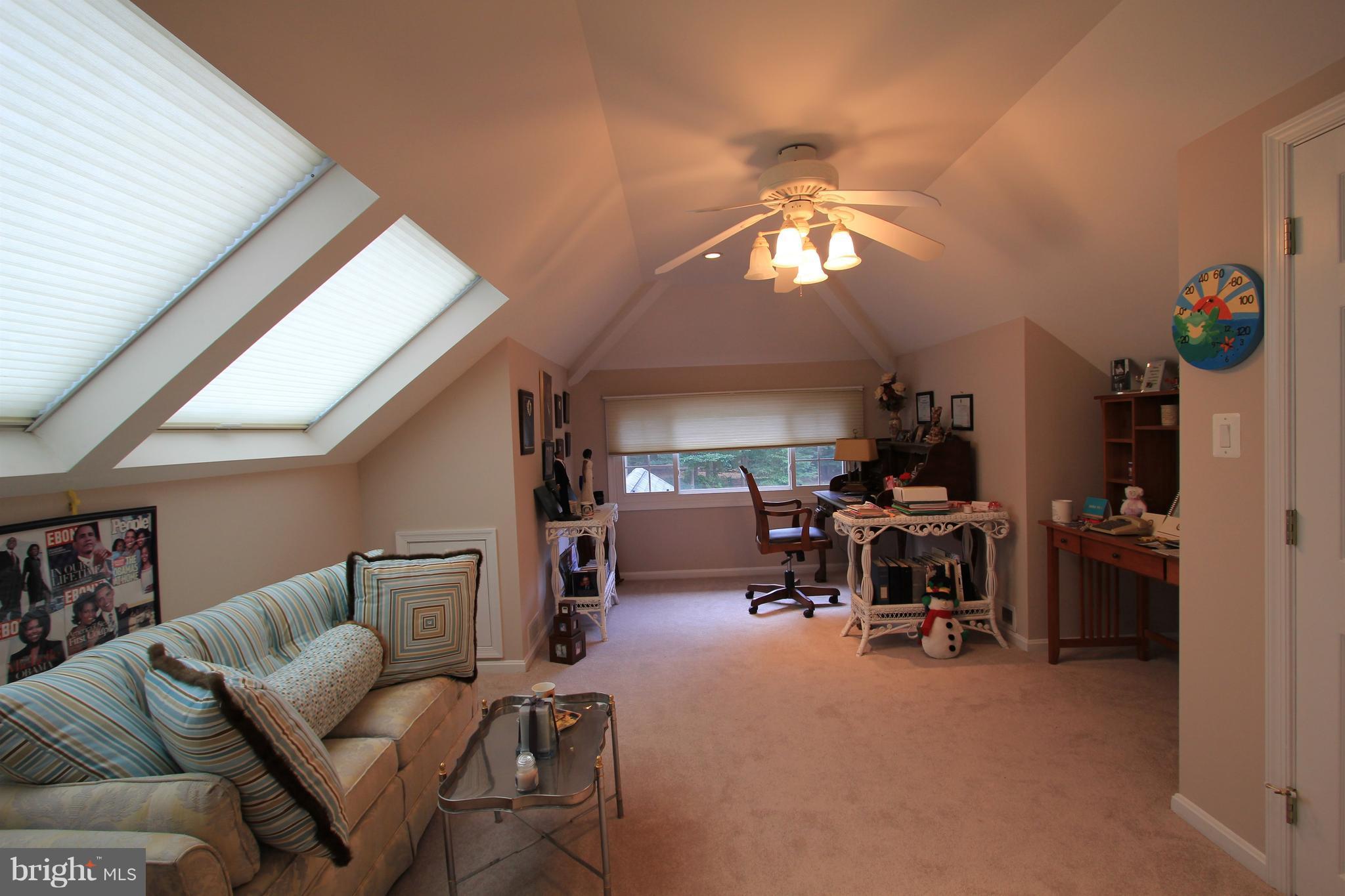2850 Dunleigh Drive Dunkirk, MD 20754 - Photo 16 of 26 a view of a livingroom with furniture and a ceiling fan