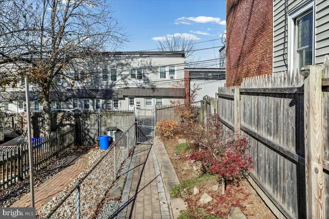 a view of a chairs and table in the balcony