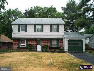 36 South Sunset Road Willingboro, NJ 08046 - Photo 1 of 1 front view of a house with a yard