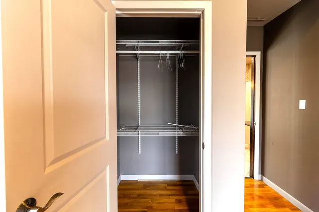 a view of a living room with a refrigerator