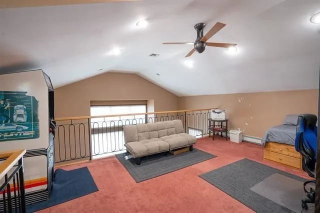 a view of a bedroom from a hallway