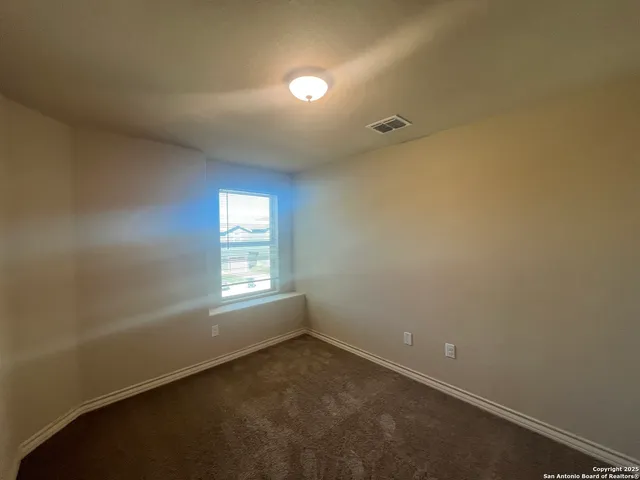 a bathroom with a white bath tub