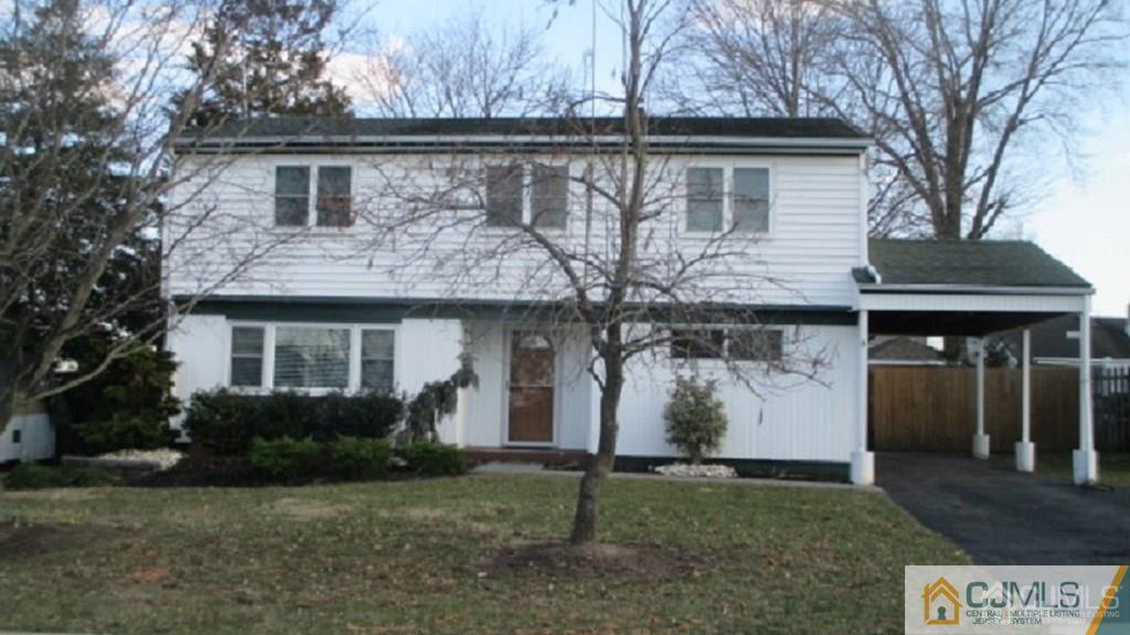 10 Longview Road Old Bridge, NJ 08857 - Photo 1 of 10 a front view of house with a garden
