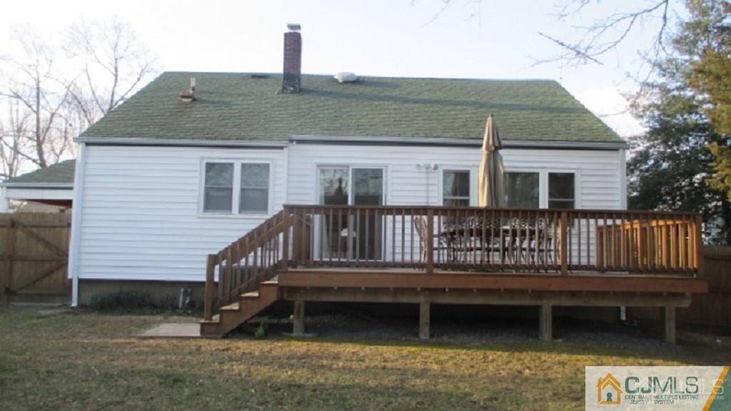 10 Longview Road Old Bridge, NJ 08857 - Photo 9 of 10 a view of a house with a wooden deck and a yard