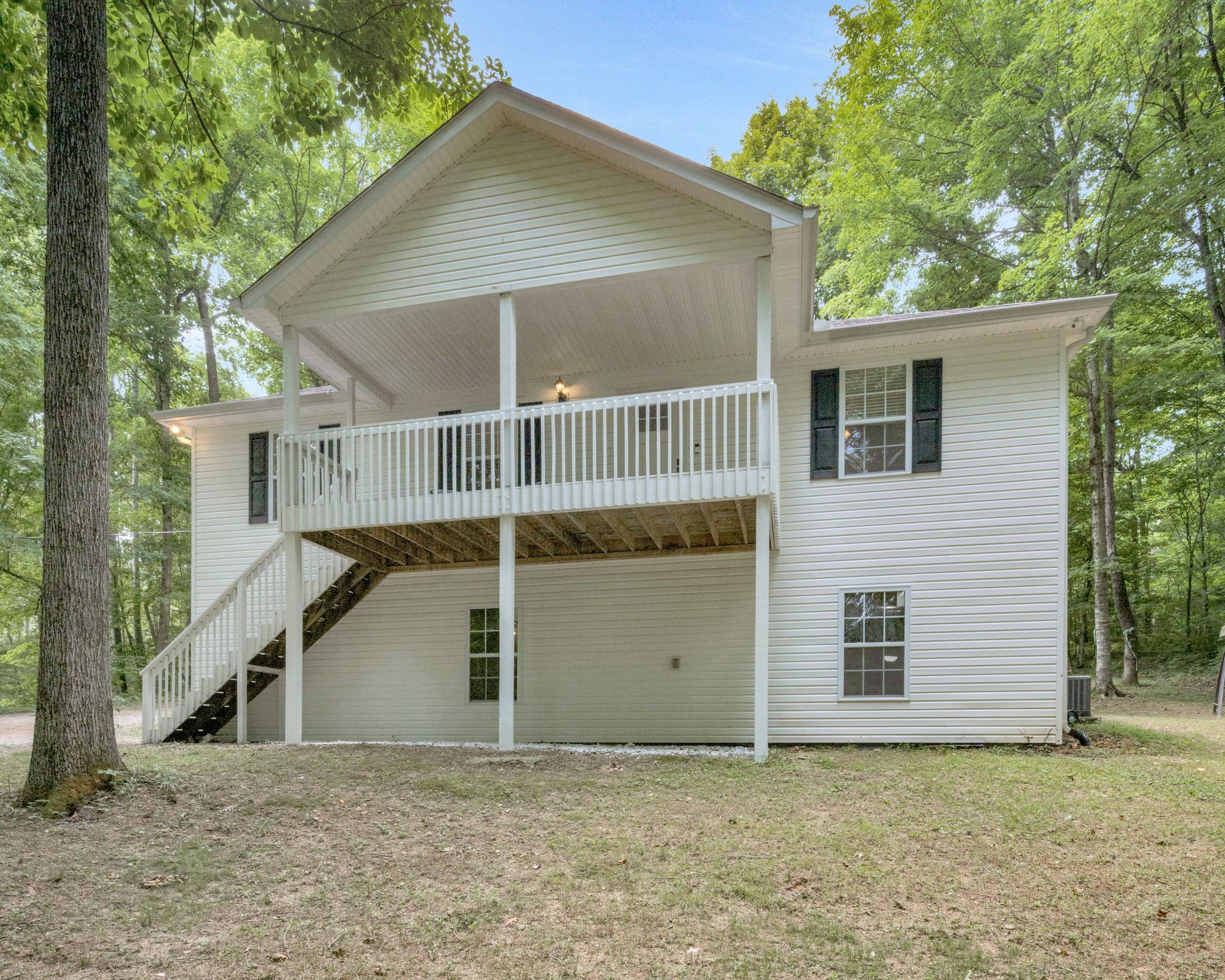 238 East Piney Road Dickson, TN 37055 - Photo 1 of 13 a view of a house with a yard