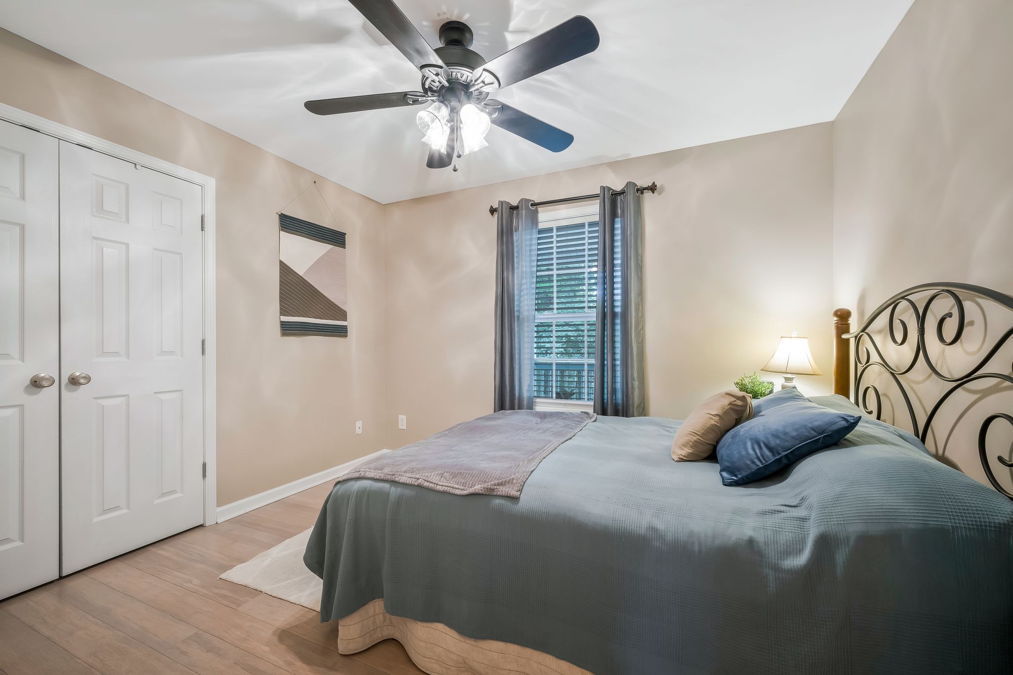 238 East Piney Road Dickson, TN 37055 - Photo 8 of 13 a bedroom with a bed and ceiling fan