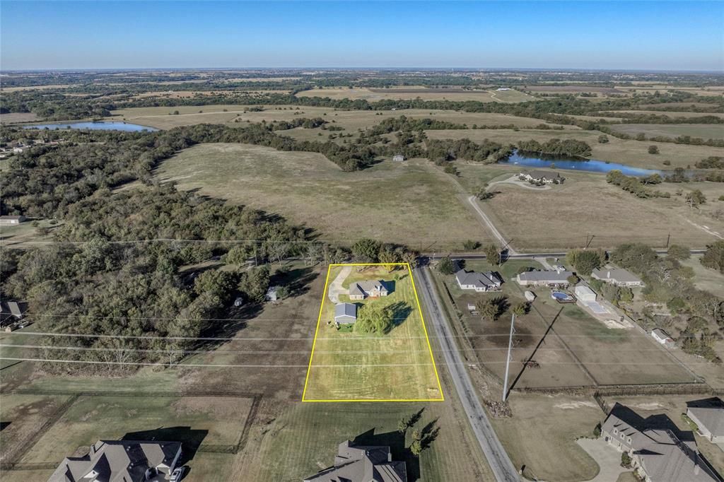 10264 Farmington Road Van Alstyne, TX 75495 - Photo 38 of 39 an aerial view of beach and ocean