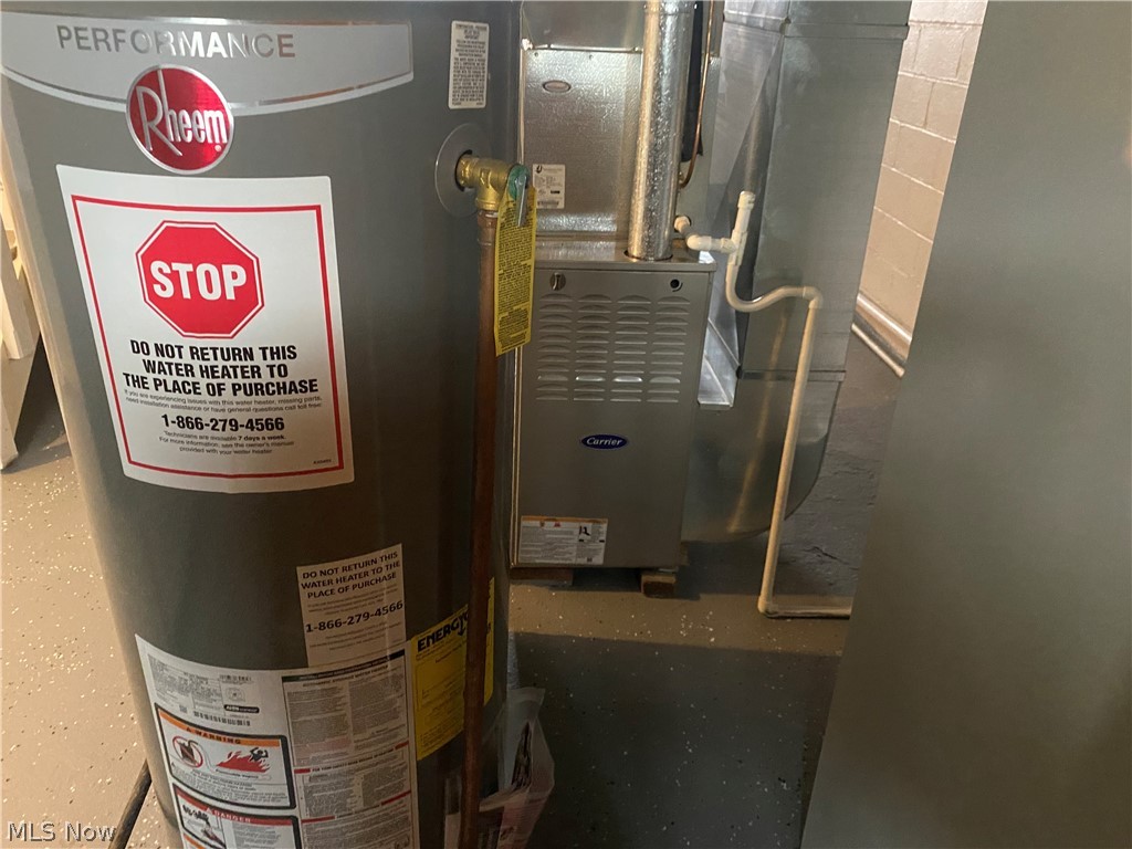 13117 Silver Road Garfield Heights, OH 44125 - Photo 20 of 20 Utility room with gas water heater