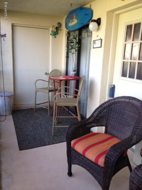 500 Catalina Road, Unit 204 Cocoa Beach, FL 32931 - Photo 12 of 14 Comfortable Porch