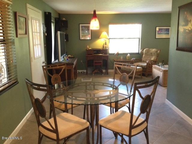 500 Catalina Road, Unit 204 Cocoa Beach, FL 32931 - Photo 4 of 14 Kitchen to Living Room