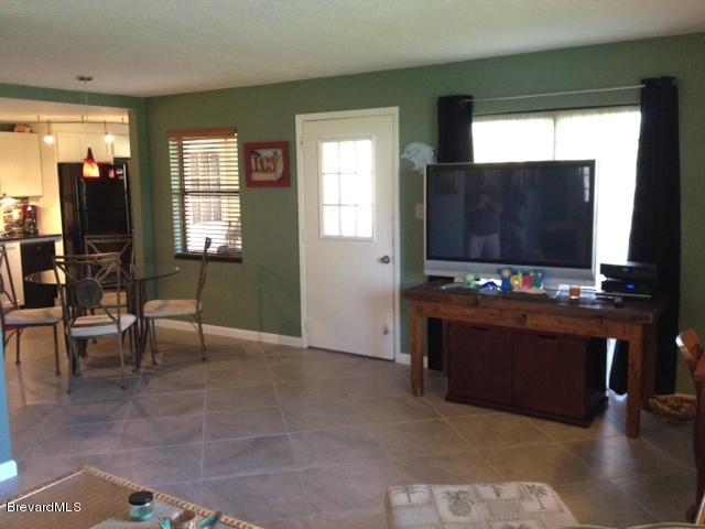 500 Catalina Road, Unit 204 Cocoa Beach, FL 32931 - Photo 8 of 14 Living Room