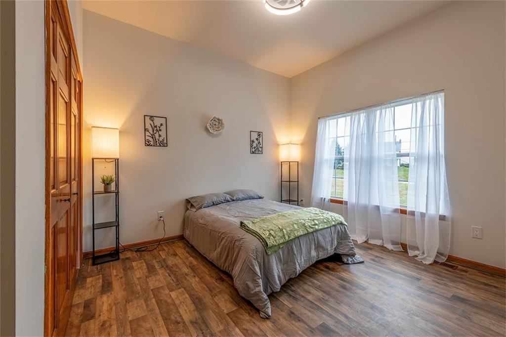 716 Rutledge Road Transfer, PA 16154 - Photo 11 of 17 a bedroom with a bed and a window