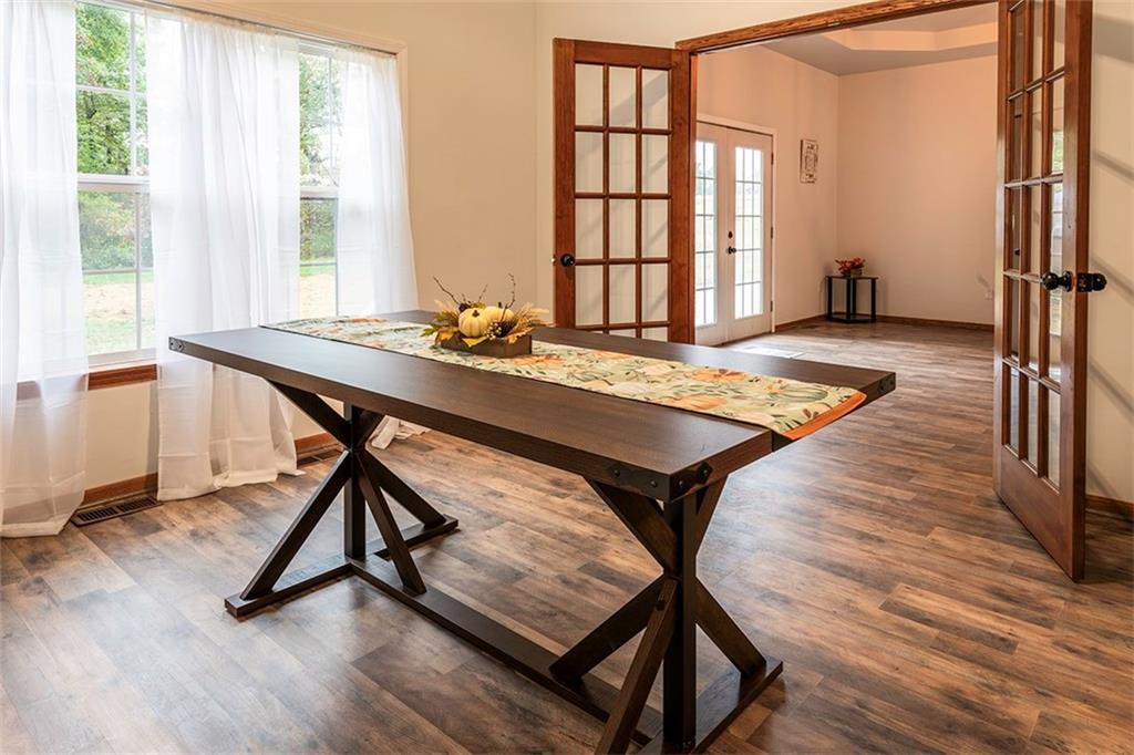 716 Rutledge Road Transfer, PA 16154 - Photo 6 of 17 a view of a workspace with furniture and a window