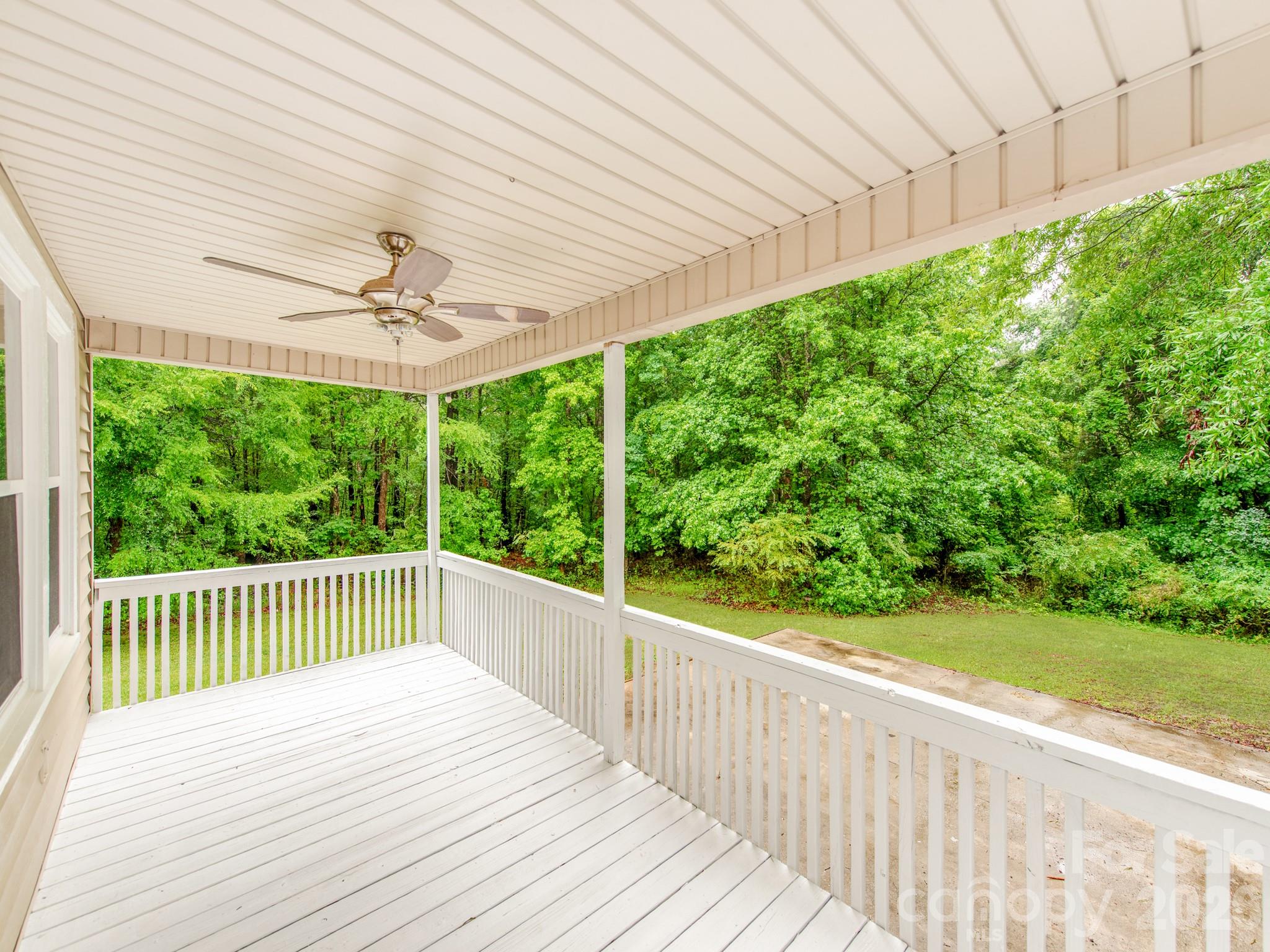 4699 Cherrystone Road Lancaster, SC 29720 - Photo 25 of 28 a view of a roof deck with wooden floor and fence