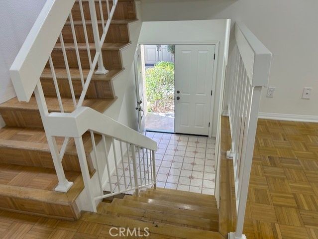 a view of storage and utility room with cabinet