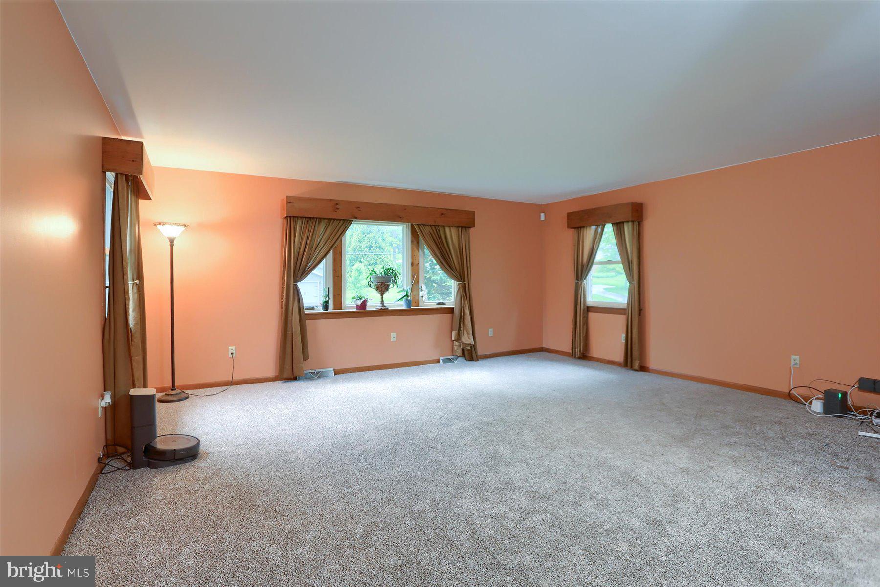 12 South Ridge Road Boiling Springs, PA 17007 - Photo 7 of 39 an empty room with a window and a livingroom