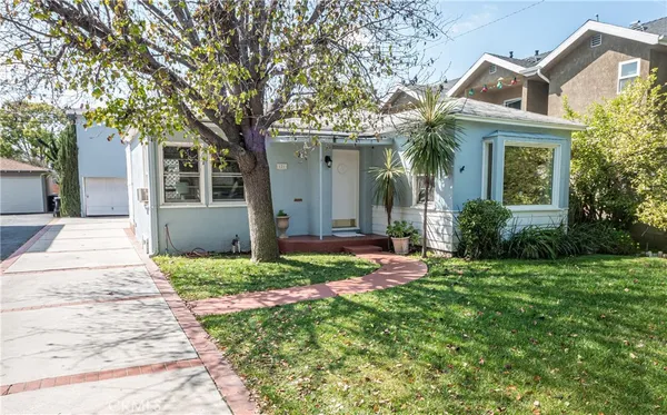 front view of a house with a yard