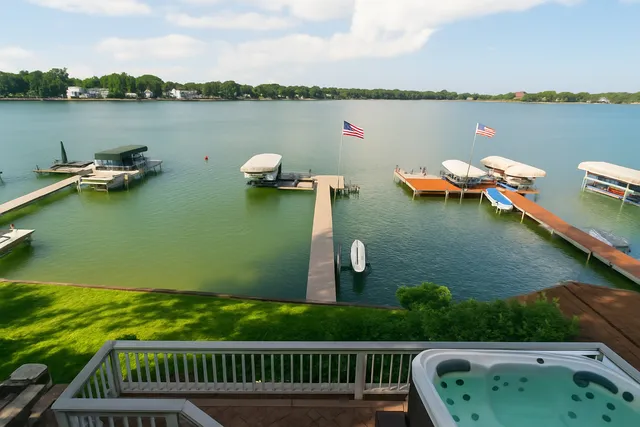 a view of a lake with houses in outdoor space