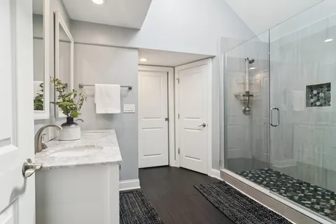 a bathroom with a sink and a mirror