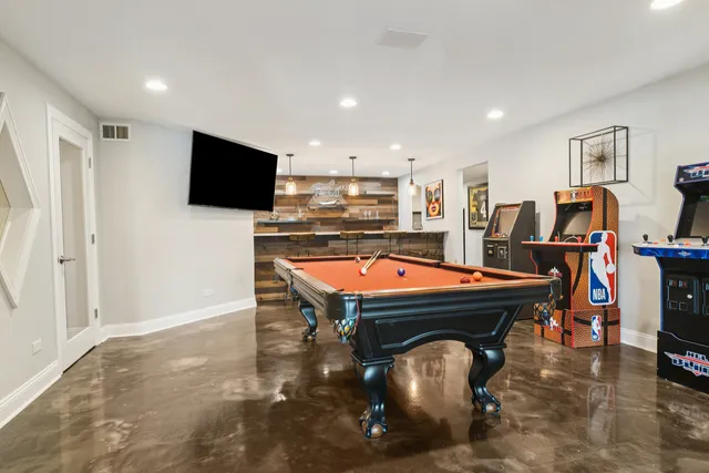 a room with furniture and a flat screen tv