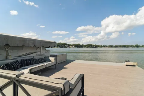 a view of lake with outdoor seating