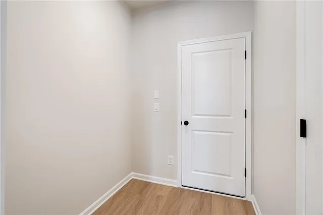 a kitchen with stainless steel appliances granite countertop a sink and cabinets