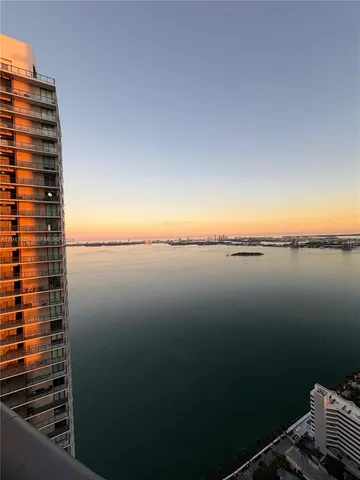 a view of lake and a city