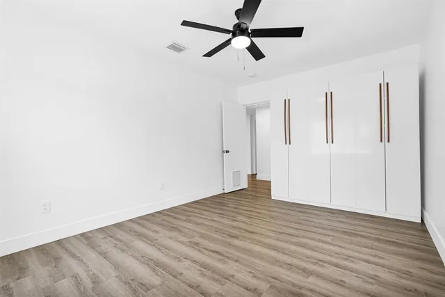 a car parked in front of a house