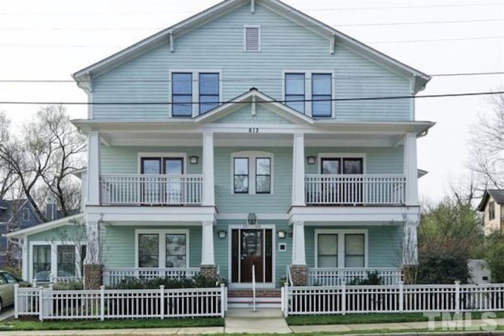613 West Cabarrus Street, Unit 202 Raleigh, NC 27603 - Photo 6 of 17 a view of a house with a yard