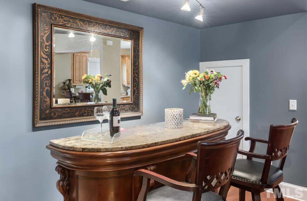 613 West Cabarrus Street, Unit 202 Raleigh, NC 27603 - Photo 8 of 17 a dining room with furniture and wooden floor