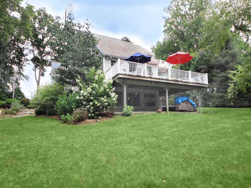 12 Ridge Farms Road Norwalk, CT 06850 - Photo 19 of 23 a view of a house with a yard