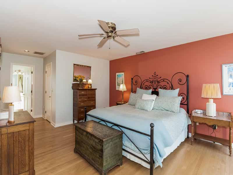 12 Ridge Farms Road Norwalk, CT 06850 - Photo 8 of 23 a bedroom with a bed and wooden floor