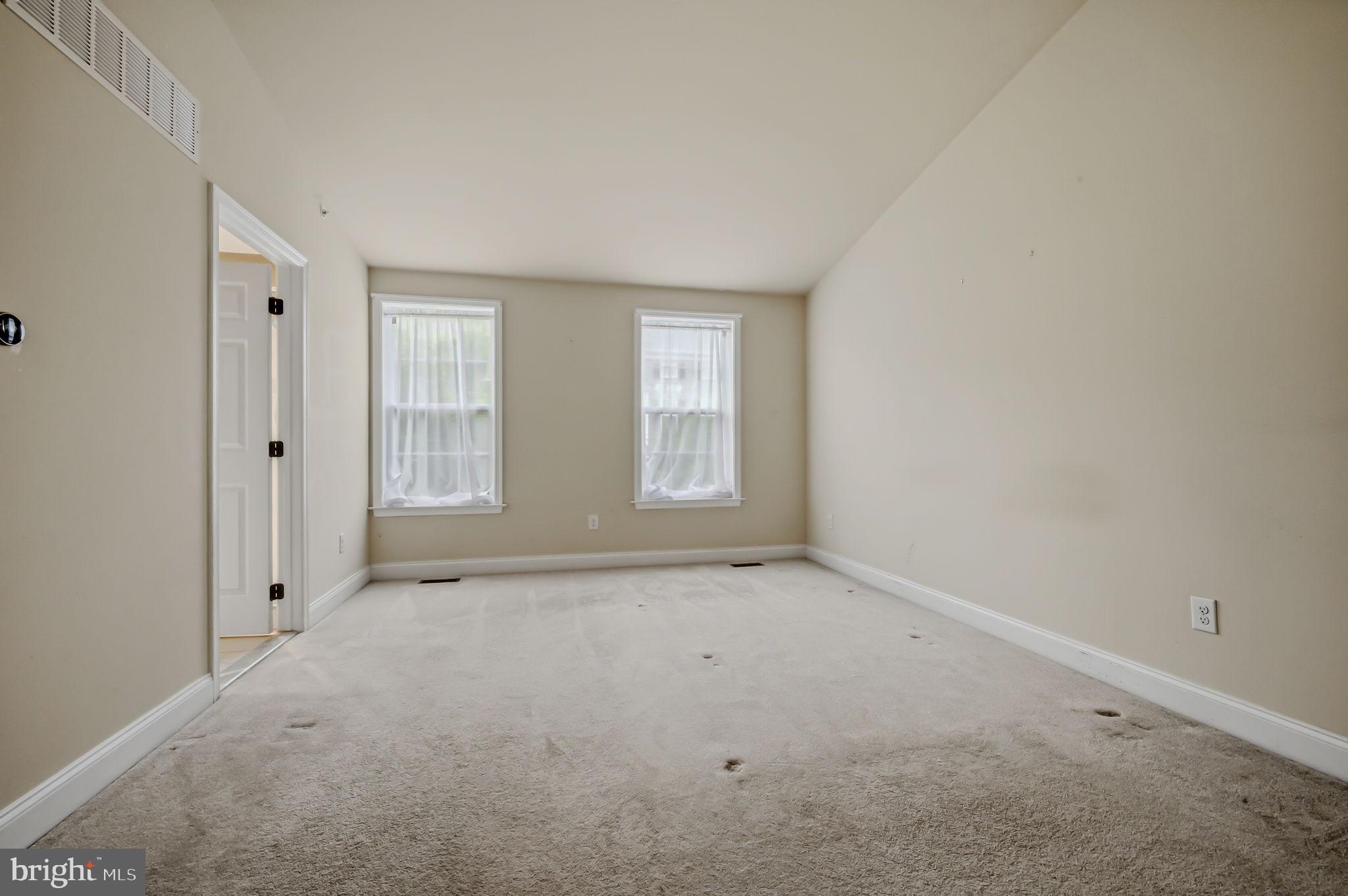 208 Jackdaw Alley, Unit 208 Springfield, PA 19064 - Photo 40 of 49 a view of an empty room with a window
