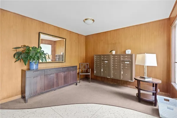 a view of workspace with furniture and window