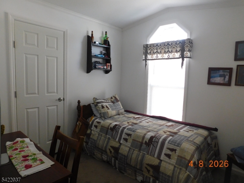 89 Back Street Oxford, NJ 07863 - Photo 11 of 17 a bedroom with a bed and a window