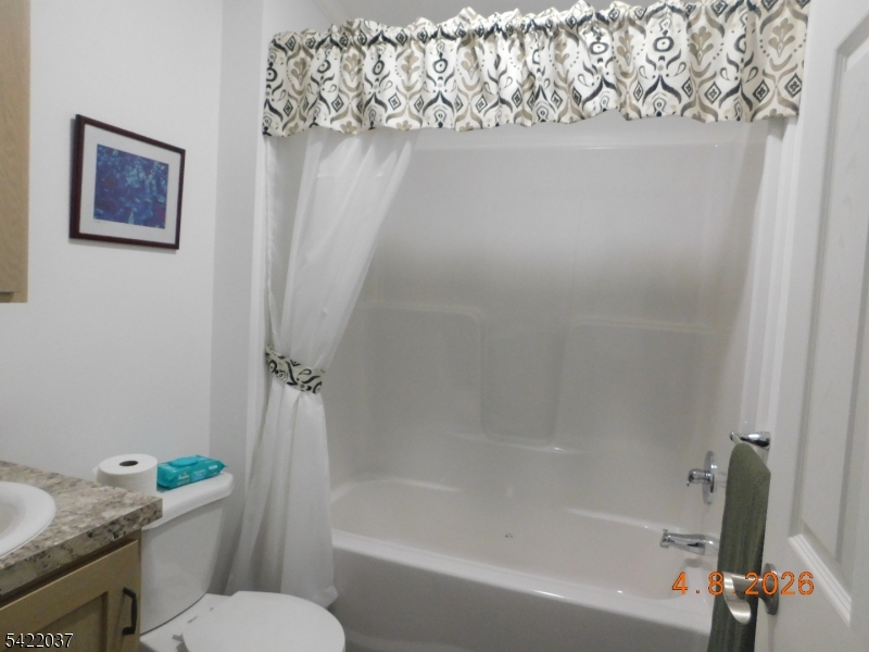 89 Back Street Oxford, NJ 07863 - Photo 12 of 17 a bath room with a toilet and a bath tub