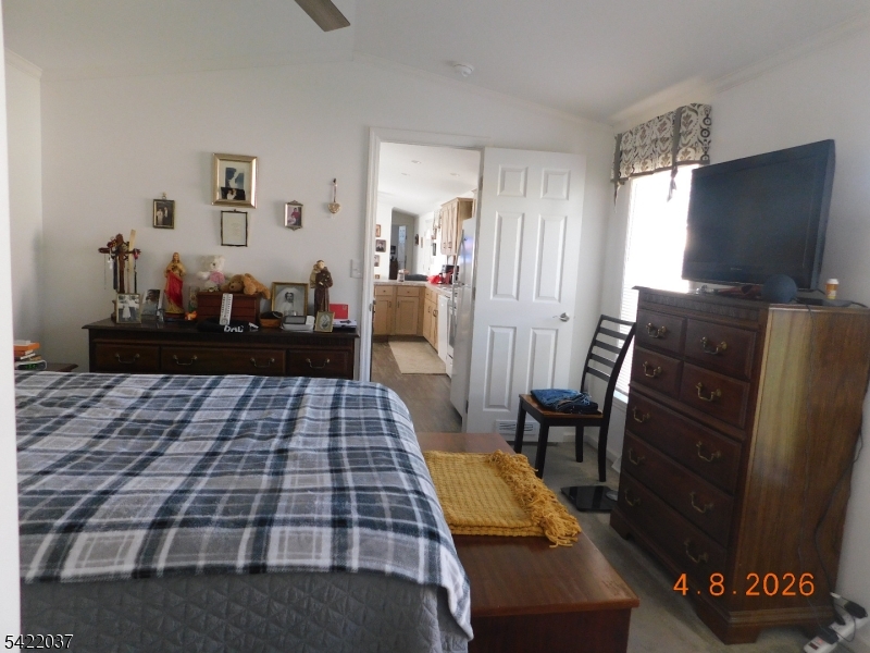 89 Back Street Oxford, NJ 07863 - Photo 17 of 17 a bedroom with a bed and flat screen tv