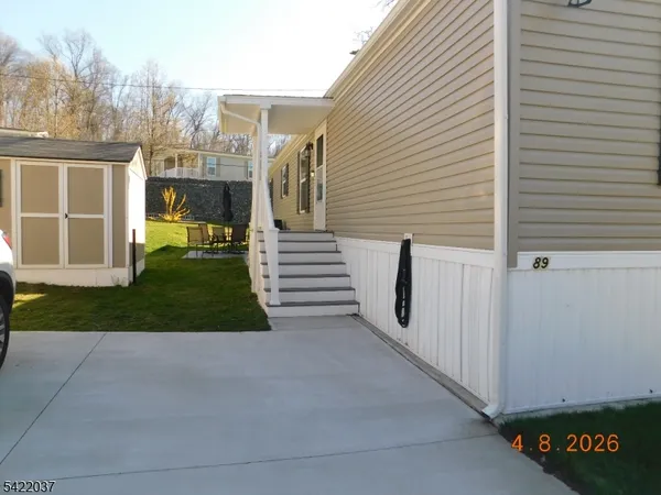 a view of a back yard of the house