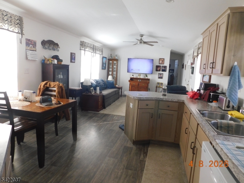 89 Back Street Oxford, NJ 07863 - Photo 8 of 17 a kitchen with a sink stove and cabinets