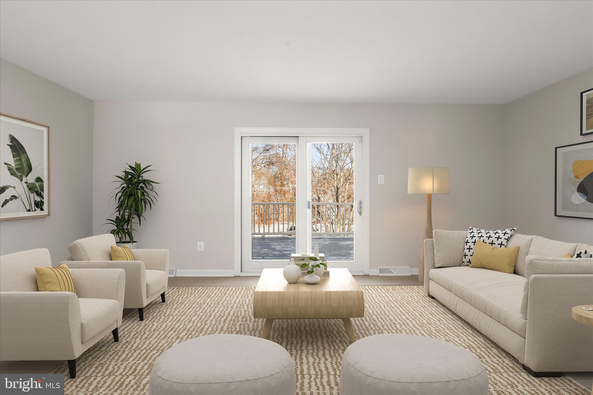 893 Century Street Hampstead, MD 21074 - Photo 10 of 42 a living room with furniture and a large window