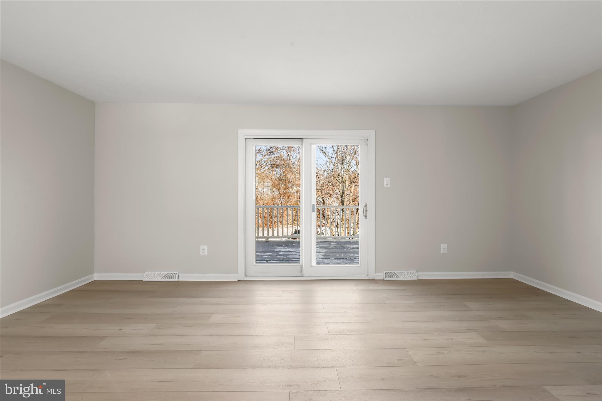893 Century Street Hampstead, MD 21074 - Photo 12 of 42 wooden floor in an empty room with a window