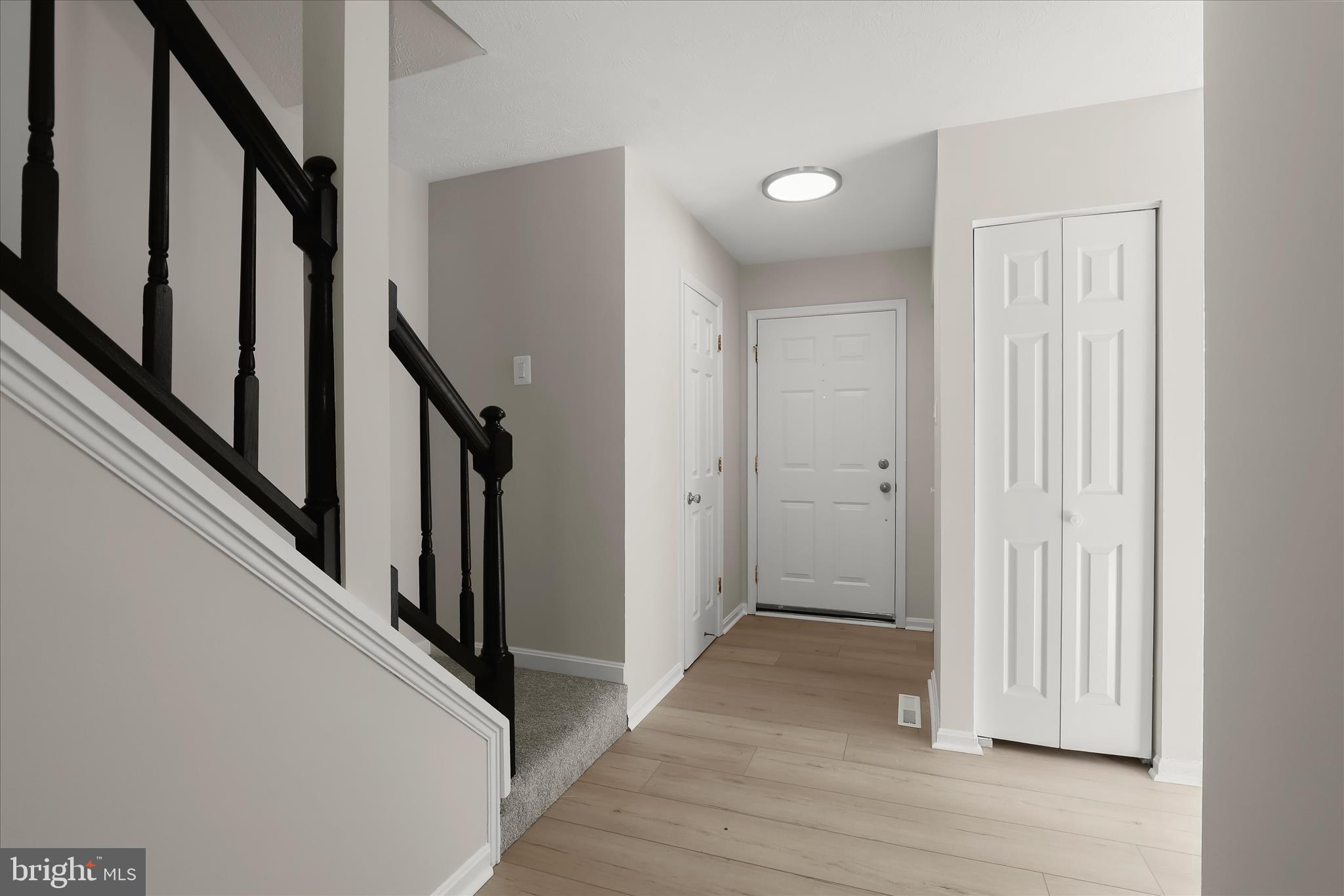 893 Century Street Hampstead, MD 21074 - Photo 2 of 42 a view of an entryway with wooden floor