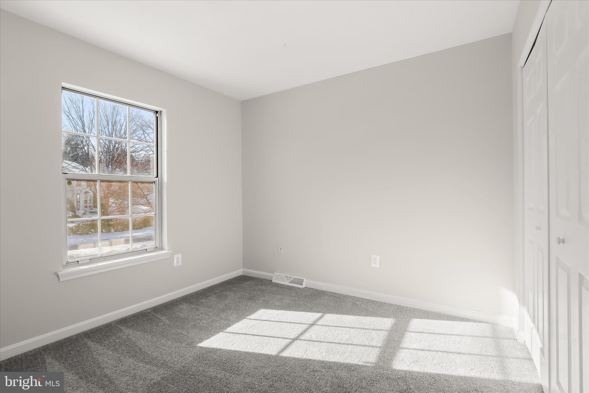 893 Century Street Hampstead, MD 21074 - Photo 21 of 42 an empty room with windows