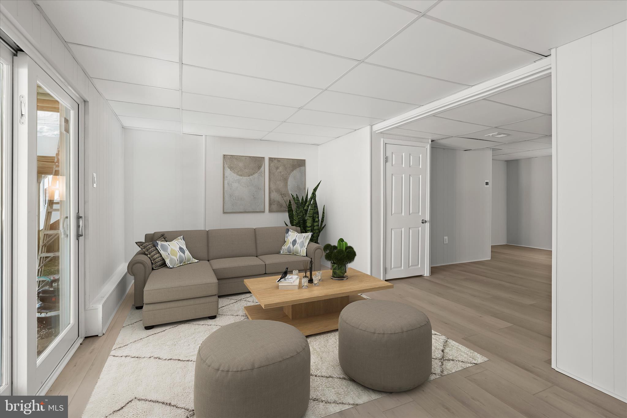 893 Century Street Hampstead, MD 21074 - Photo 25 of 42 a living room with furniture and wooden floor