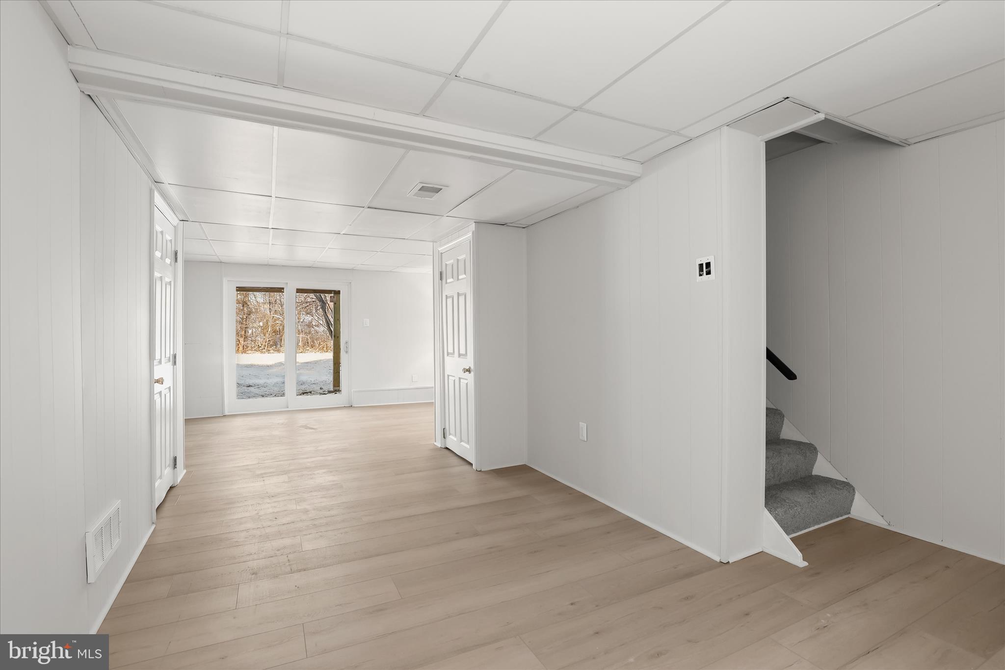 893 Century Street Hampstead, MD 21074 - Photo 26 of 42 a view of a hallway with wooden floor and closet