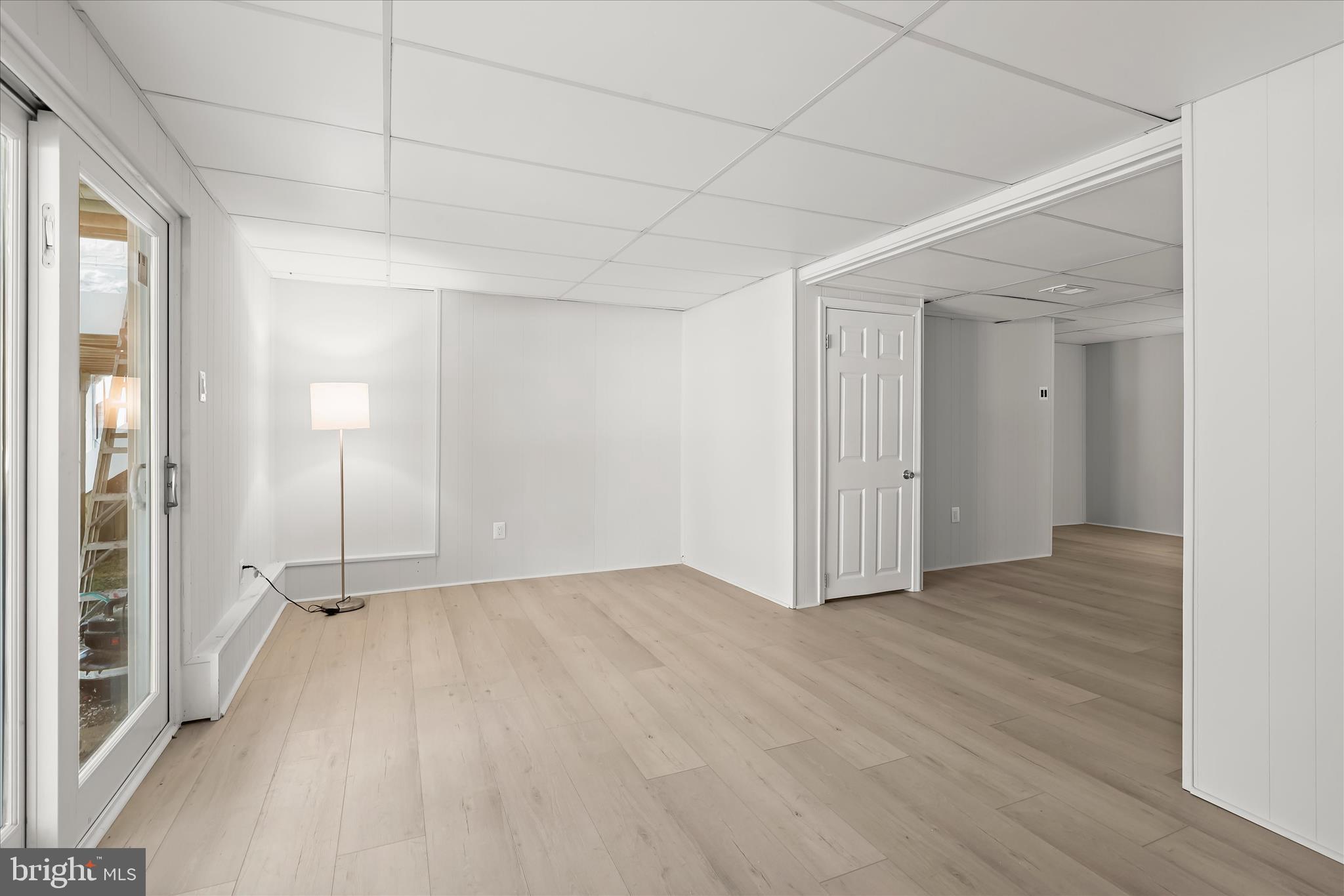 893 Century Street Hampstead, MD 21074 - Photo 28 of 42 a view of empty room with wooden floor