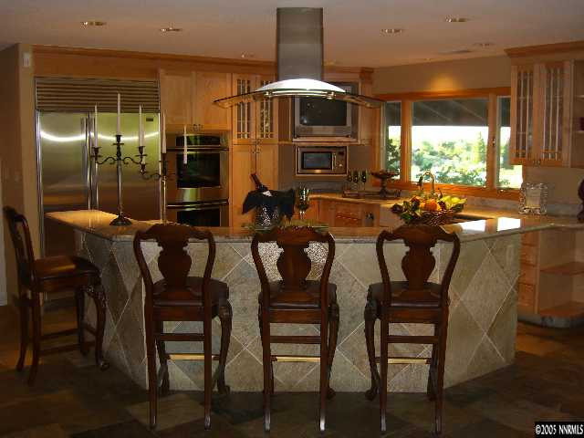 3450 Quilici Road Reno, NV 89511 - Photo 2 of 8 a dinning area with furniture and window