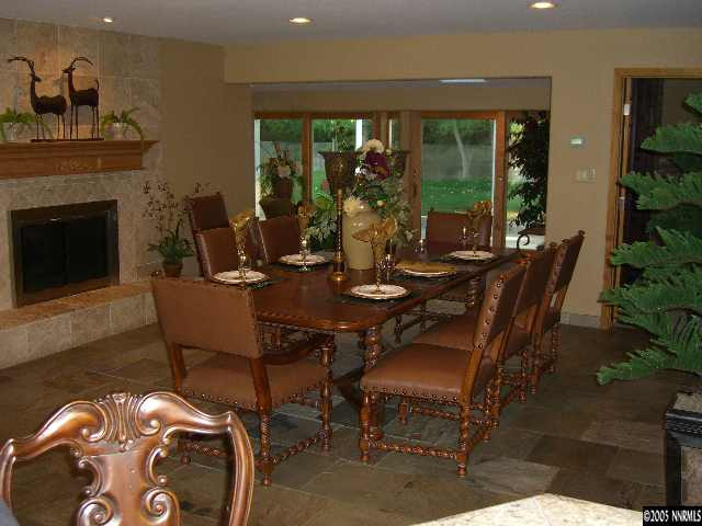 3450 Quilici Road Reno, NV 89511 - Photo 3 of 8 a view of a dining room with furniture window and outside view