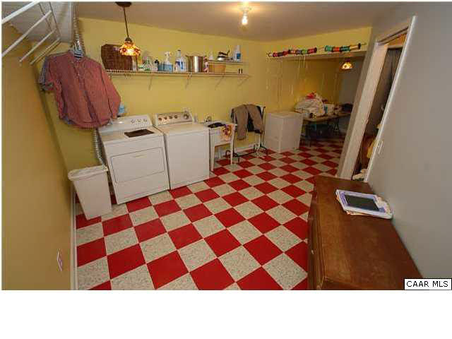 545 Jonquil Road Ruckersville, VA 22968 - Photo 21 of 26 a bathroom with a sink toilet and shower