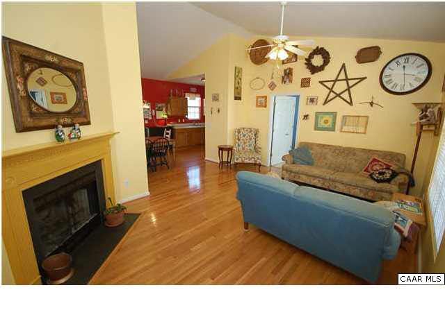 545 Jonquil Road Ruckersville, VA 22968 - Photo 7 of 26 a living room with furniture and a fireplace